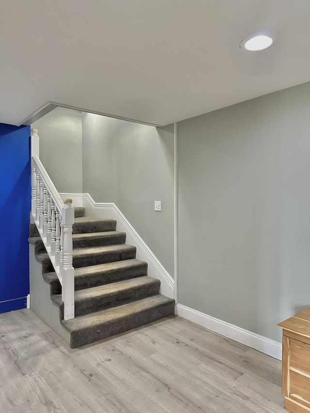 3125 Old Bull Rd, Eubank, KY 42567 - staircase featuring wood finished floors and baseboards