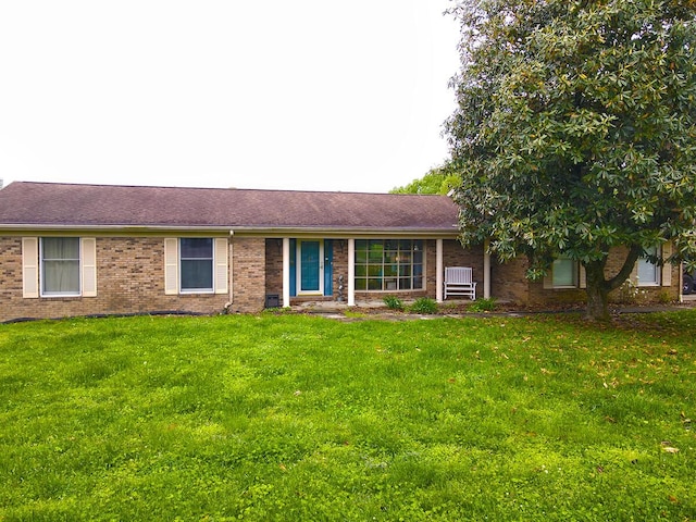 3125 Old Bull Rd, Eubank, KY 42567 - ranch-style home featuring brick siding, a front lawn, and a shingled roof