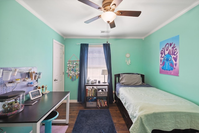 bedroom with ornamental molding, dark wood-style floors, baseboards, and a ceiling fan
