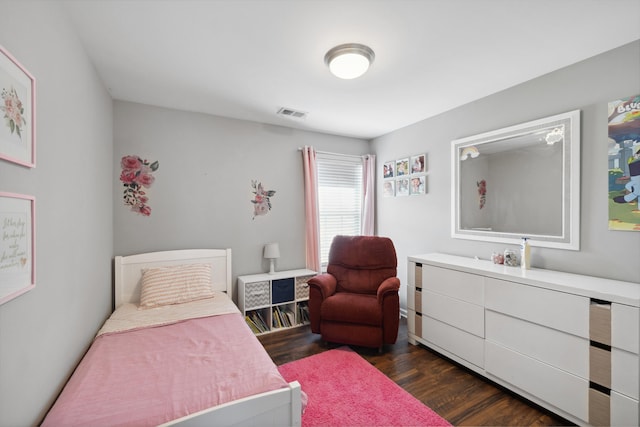 bedroom featuring dark wood-type flooring