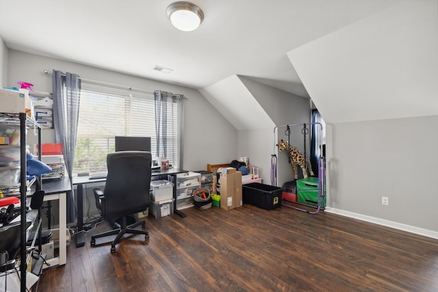 office featuring wood finished floors, vaulted ceiling, and baseboards