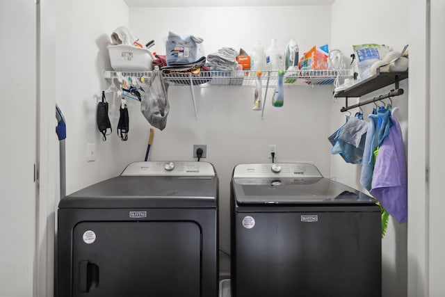 laundry area with washer and dryer