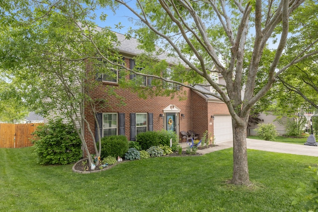 view of front facade with driveway and brick siding