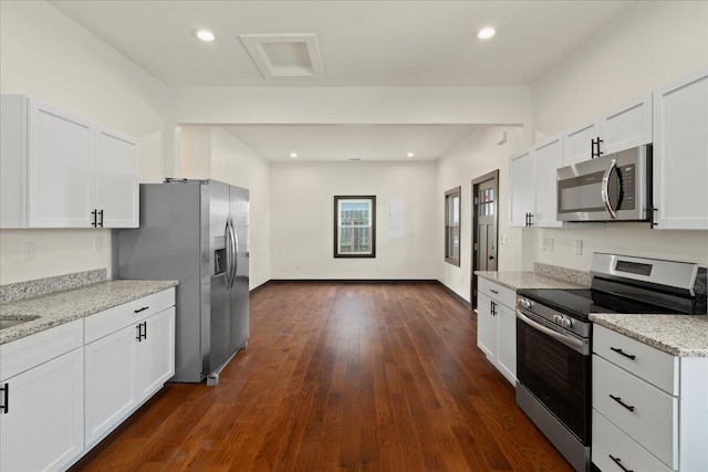 224 Douglas Ave, Versailles, KY 40383 - kitchen featuring stainless steel appliances, dark wood finished floors, white cabinets, light stone countertops, and recessed lighting