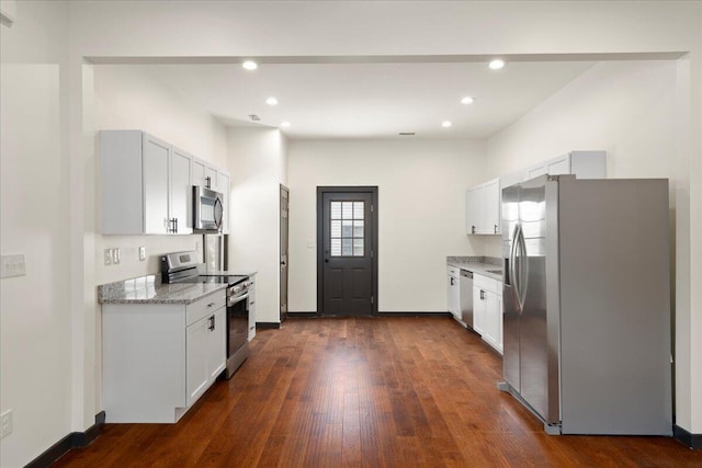 224 Douglas Ave, Versailles, KY 40383 - kitchen with appliances with stainless steel finishes, dark wood-type flooring, recessed lighting, white cabinets, and light stone counters