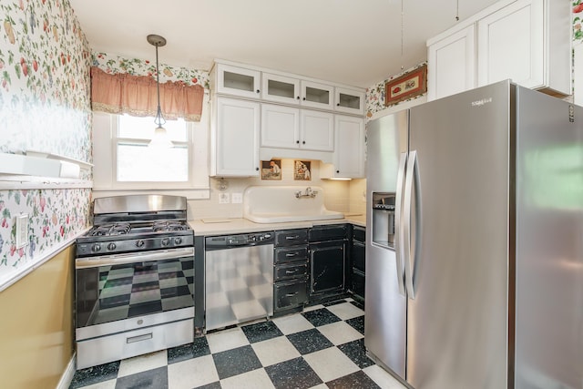 416 W Main St, Harrodsburg, KY 40330 - kitchen with appliances with stainless steel finishes, light flooring, white cabinets, light countertops, and a sink