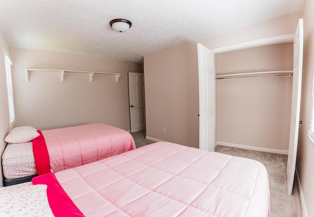 600 Carriage Ln, Jamestown, KY 42629 - carpeted bedroom featuring a closet and baseboards