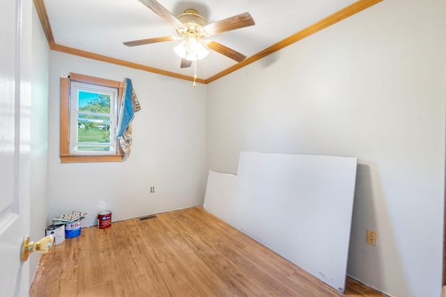 10708 Battlefield Memorial Hwy, Berea, KY 40403 - unfurnished room with crown molding, wood finished floors, and ceiling fan