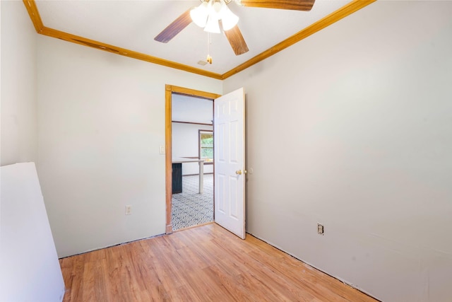 10708 Battlefield Memorial Hwy, Berea, KY 40403 - spare room featuring ornamental molding, light wood-style flooring, and a ceiling fan