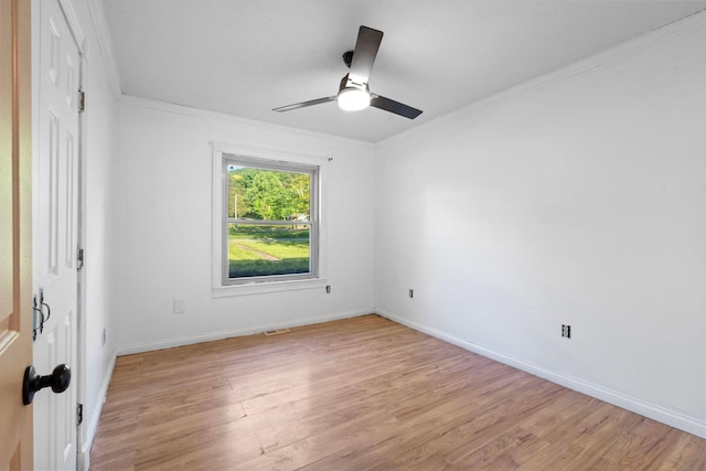 10708 Battlefield Memorial Hwy, Berea, KY 40403 - unfurnished room featuring crown molding, light wood-style flooring, baseboards, and a ceiling fan