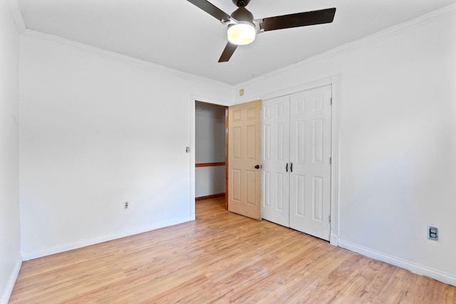 10708 Battlefield Memorial Hwy, Berea, KY 40403 - unfurnished bedroom featuring light wood finished floors, baseboards, crown molding, a closet, and ceiling fan