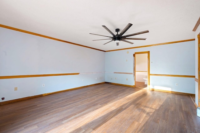 10708 Battlefield Memorial Hwy, Berea, KY 40403 - spare room with ceiling fan, wood finished floors, ornamental molding, and baseboards