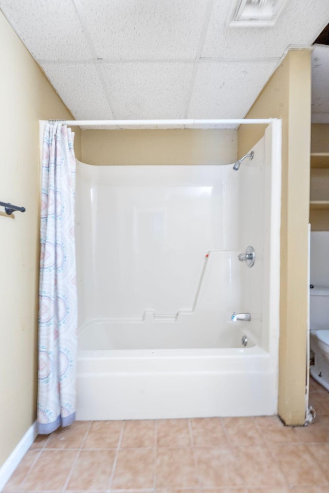 10708 Battlefield Memorial Hwy, Berea, KY 40403 - full bath with a paneled ceiling, shower / tub combo, tile patterned flooring, and baseboards