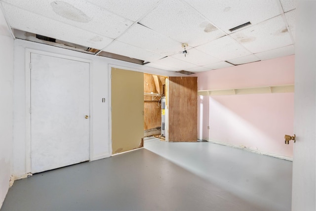 10708 Battlefield Memorial Hwy, Berea, KY 40403 - below grade area with a paneled ceiling and water heater