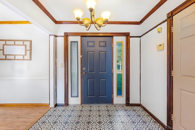 10708 Battlefield Memorial Hwy, Berea, KY 40403 - foyer with a chandelier, baseboards, and ornamental molding