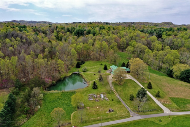 1610 Steele Branch Rd, West Liberty, KY 41472 - aerial view of property and surrounding area featuring a nearby body of water and a heavily wooded area