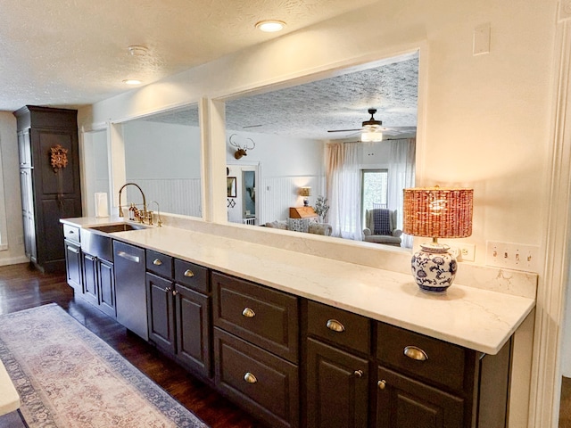 1610 Steele Branch Rd, West Liberty, KY 41472 - kitchen featuring stainless steel dishwasher, a textured ceiling, dark wood-style flooring, a sink, and a ceiling fan