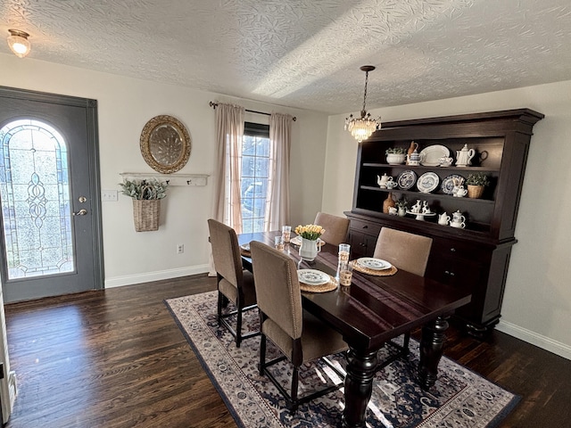 1610 Steele Branch Rd, West Liberty, KY 41472 - dining room featuring a chandelier, dark wood-style floors, baseboards, and a textured ceiling