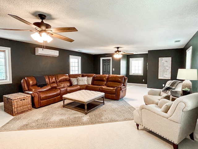 1610 Steele Branch Rd, West Liberty, KY 41472 - living room featuring a ceiling fan, a wall mounted air conditioner, carpet, a textured ceiling, and healthy amount of natural light