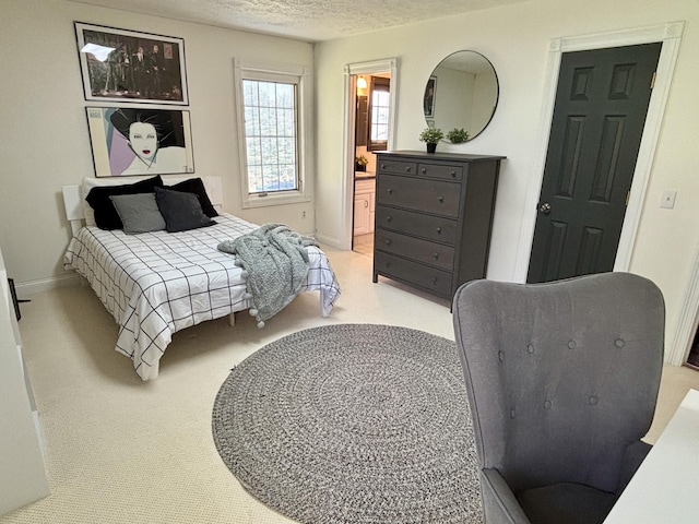 1610 Steele Branch Rd, West Liberty, KY 41472 - bedroom with a textured ceiling, baseboards, and ensuite bathroom
