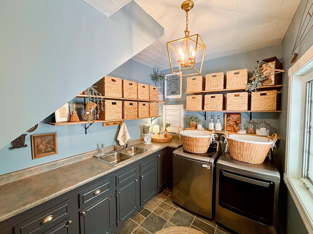 1610 Steele Branch Rd, West Liberty, KY 41472 - kitchen with open shelves, a sink, separate washer and dryer, a chandelier, and decorative light fixtures