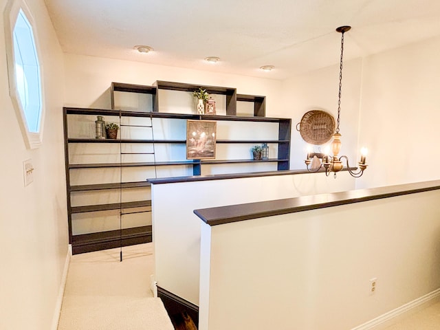 1610 Steele Branch Rd, West Liberty, KY 41472 - kitchen featuring baseboards, a chandelier, and dark countertops