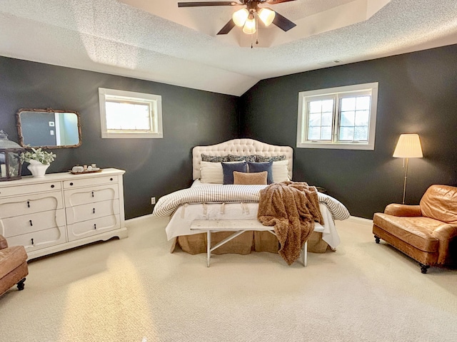 1610 Steele Branch Rd, West Liberty, KY 41472 - carpeted bedroom with baseboards, a ceiling fan, vaulted ceiling, and a textured ceiling