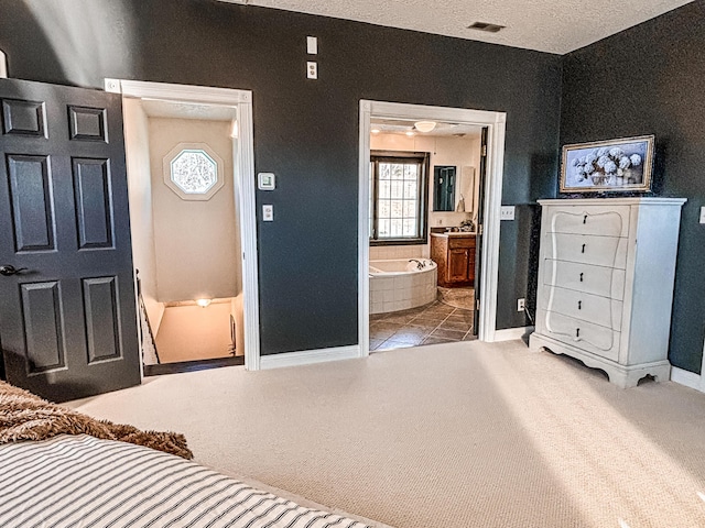 1610 Steele Branch Rd, West Liberty, KY 41472 - carpeted bedroom featuring baseboards and connected bathroom