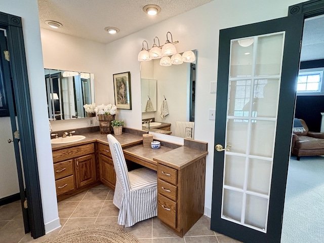 1610 Steele Branch Rd, West Liberty, KY 41472 - ensuite bathroom featuring vanity, tile patterned floors, and a textured ceiling