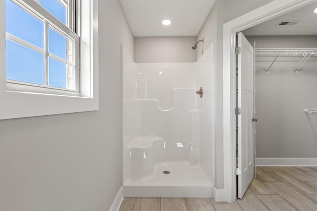 469 Wyldwood Way, Berea, KY 40403 - full bath with a stall shower, baseboards, a walk in closet, wood finish floors, and recessed lighting