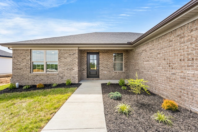 469 Wyldwood Way, Berea, KY 40403 - view of exterior entry featuring brick siding and roof with shingles