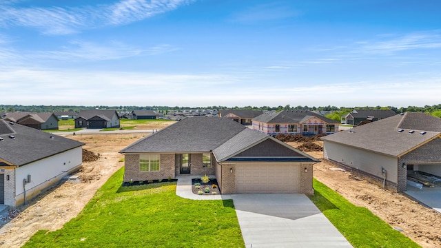 469 Wyldwood Way, Berea, KY 40403 - view of front facade featuring a residential view, brick siding, concrete driveway, and a garage