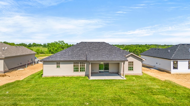 469 Wyldwood Way, Berea, KY 40403 - rear view of property featuring a patio area, a lawn, roof with shingles, and dirt driveway