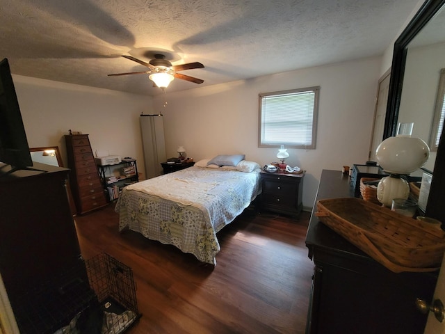 1267 Crab Orchard Rd, Lancaster, KY 40444 - bedroom with dark wood-style flooring, a textured ceiling, and ceiling fan