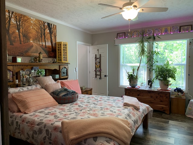 1306 Johnson Rd, Harrodsburg, KY 40330 - bedroom with a textured ceiling, wood finished floors, ornamental molding, and ceiling fan
