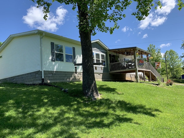 1306 Johnson Rd, Harrodsburg, KY 40330 - rear view of property with a yard, stairs, and crawl space