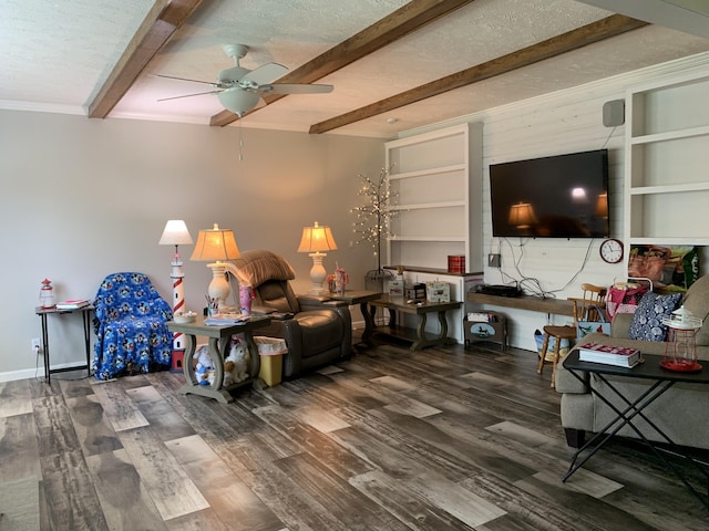 1306 Johnson Rd, Harrodsburg, KY 40330 - living room with beamed ceiling, ceiling fan, wood finished floors, ornamental molding, and a textured ceiling