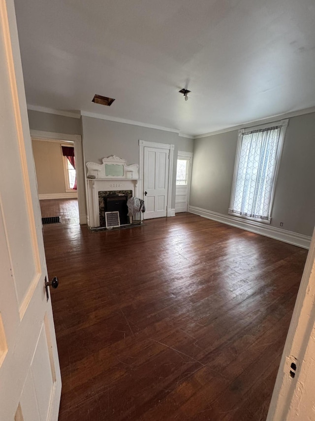 107 E N St, Carlisle, KY 40311 - unfurnished living room with a premium fireplace, ornamental molding, and dark wood-type flooring