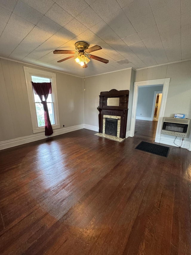 107 E N St, Carlisle, KY 40311 - unfurnished living room with heating unit, a fireplace with flush hearth, wood finished floors, ceiling fan, and crown molding