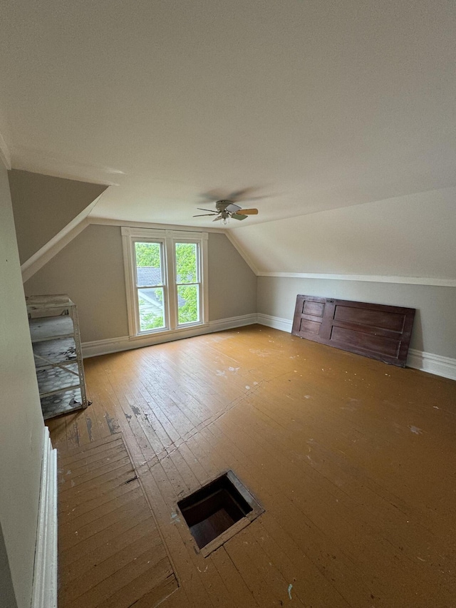 107 E N St, Carlisle, KY 40311 - additional living space featuring wood-type flooring, lofted ceiling, and a ceiling fan