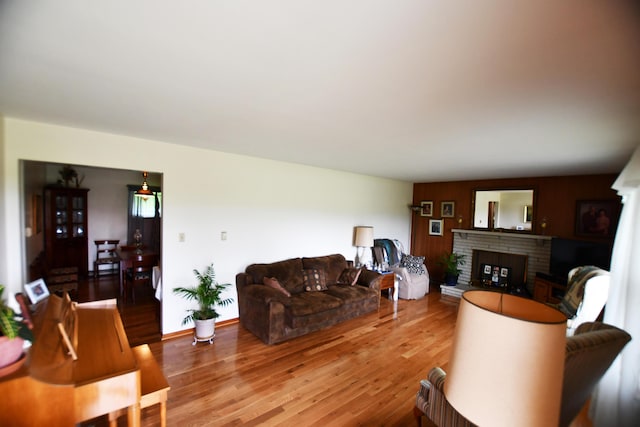 755 Mckee Rd, Irvine, KY 40336 - living area with light wood-style flooring and a fireplace