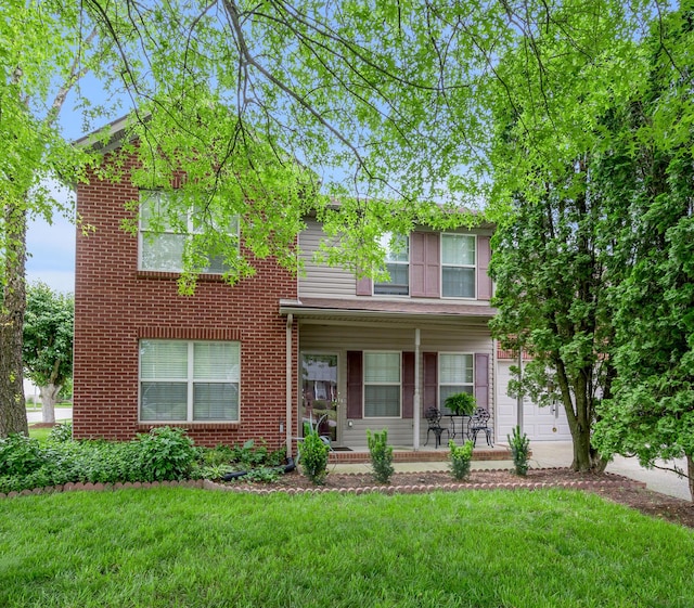 356 Weslyn Way, Nicholasville, KY 40356 - view of front of home with covered porch, a front lawn, and brick siding