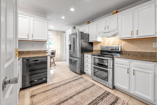 356 Weslyn Way, Nicholasville, KY 40356 - kitchen with appliances with stainless steel finishes, under cabinet range hood, white cabinetry, light tile patterned floors, and recessed lighting