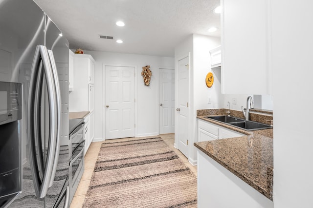 356 Weslyn Way, Nicholasville, KY 40356 - kitchen featuring stainless steel appliances, a sink, recessed lighting, white cabinets, and dark stone countertops