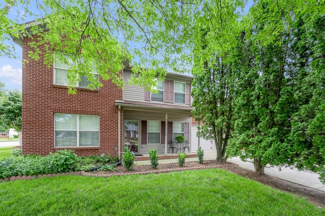 356 Weslyn Way, Nicholasville, KY 40356 - view of front of house featuring a front lawn, a porch, and brick siding