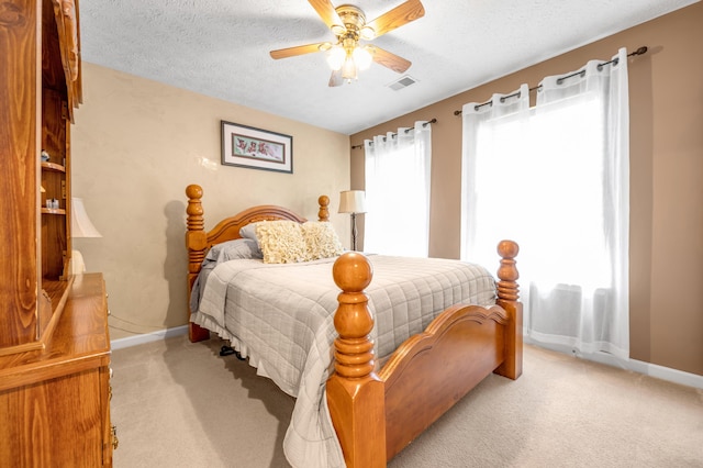 356 Weslyn Way, Nicholasville, KY 40356 - bedroom with baseboards, light carpet, a textured ceiling, and a ceiling fan