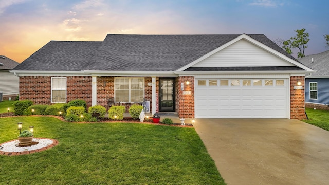281 Meridian Way, Richmond, KY 40475 - view of front of property featuring brick siding, a front lawn, driveway, and a garage