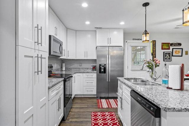 281 Meridian Way, Richmond, KY 40475 - kitchen with stainless steel appliances, a sink, white cabinetry, dark wood-type flooring, and decorative light fixtures
