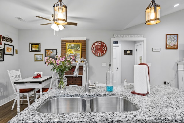 281 Meridian Way, Richmond, KY 40475 - kitchen featuring a sink, a ceiling fan, wood finished floors, and light stone counters