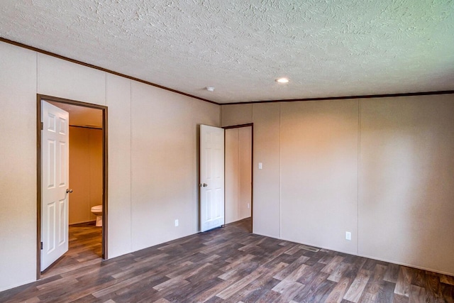 2832 Two Mile Rd, Winchester, KY 40391 - unfurnished bedroom with dark wood finished floors, crown molding, a textured ceiling, and recessed lighting
